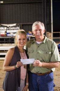 UCWHA President Jimmy Sherrell presents scholarship check for $500.00 to Alexis Clark.